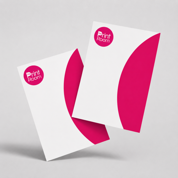 Premium Print Room flyer mockup showing two overlapping custom printed flyers with a modern branded design, round logo, and vibrant magenta graphics on a light grey studio background.
