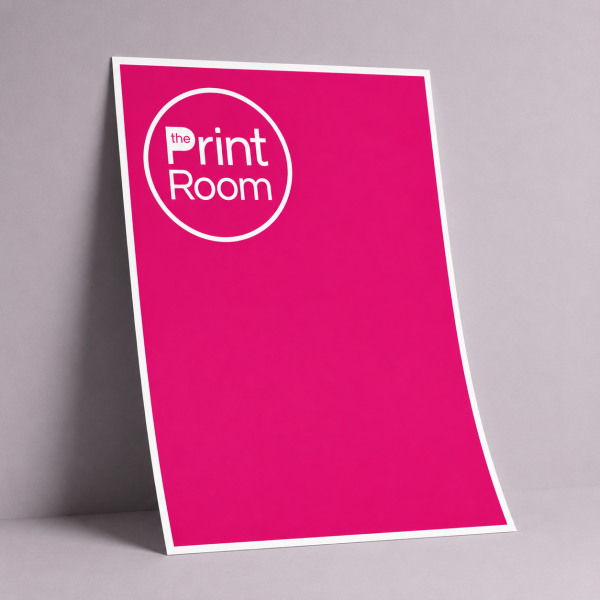 Large pink printed poster featuring The Print Room logo, displayed against a neutral studio background.