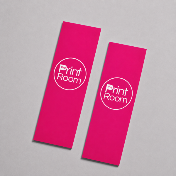 Two pink custom printed bookmarks featuring The Print Room logo on a neutral background.