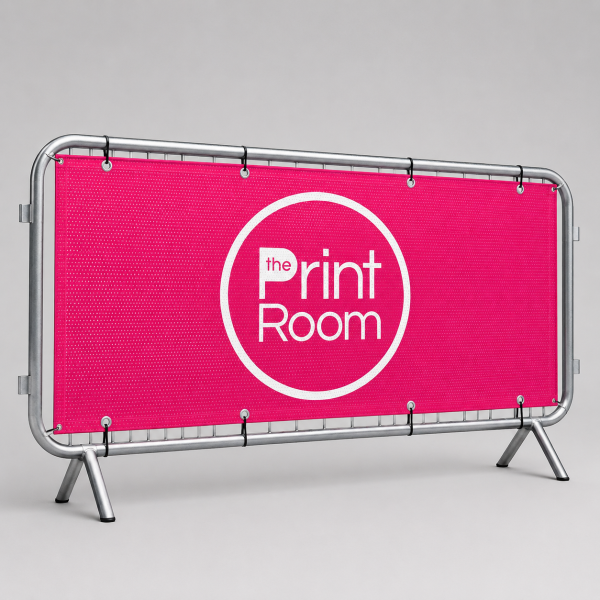 Pedestrian crowd barrier banner with The Print Room branding, printed on AirMesh material with eyelet fixings, displayed on a metal crowd control barrier for outdoor event and promotional signage.